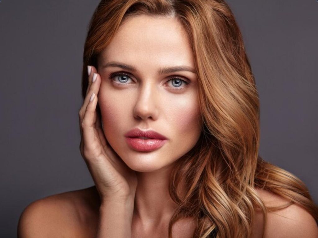 a beautiful lady with long brown hair